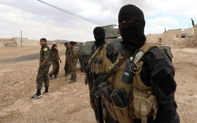 DSG savaşçılarının 2 IŞİD'liyi infaz ettiği iddia edildi...