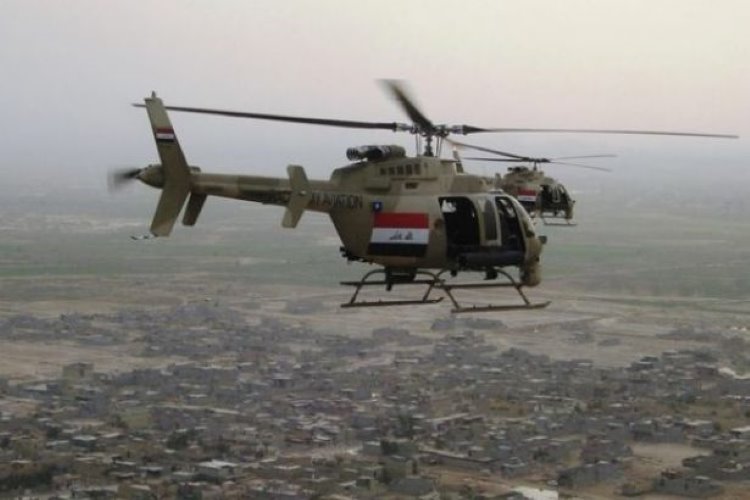Xurmatû'da Kürtler şimdi de Irak helikopterlerinin bombardımanından kaçıyor