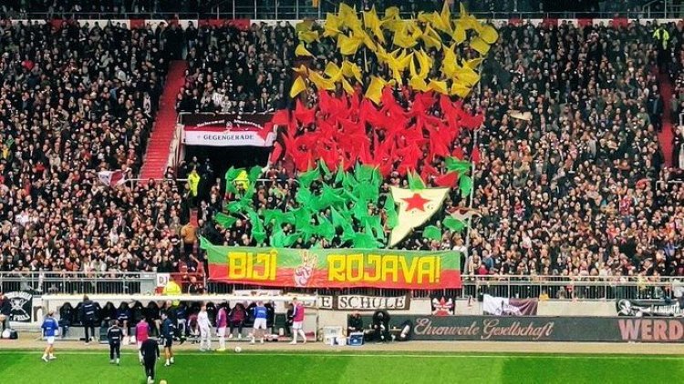 Almanya ligi maçında Rojava'ya destek pankartı