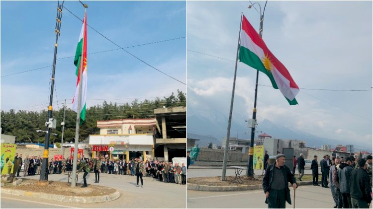 Duhok’ta 3 şehit Peşmerge’nin kardeşi bölgenin en büyük Kürdistan bayrağını dikti